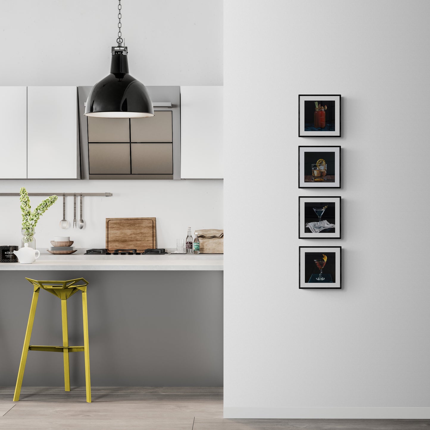 A set of four cocktail prints, arranged in a vertical line on a kitchen wall. Arranged from top to bottom: Caesar, Old Fashioned, Martini, Manhattan.