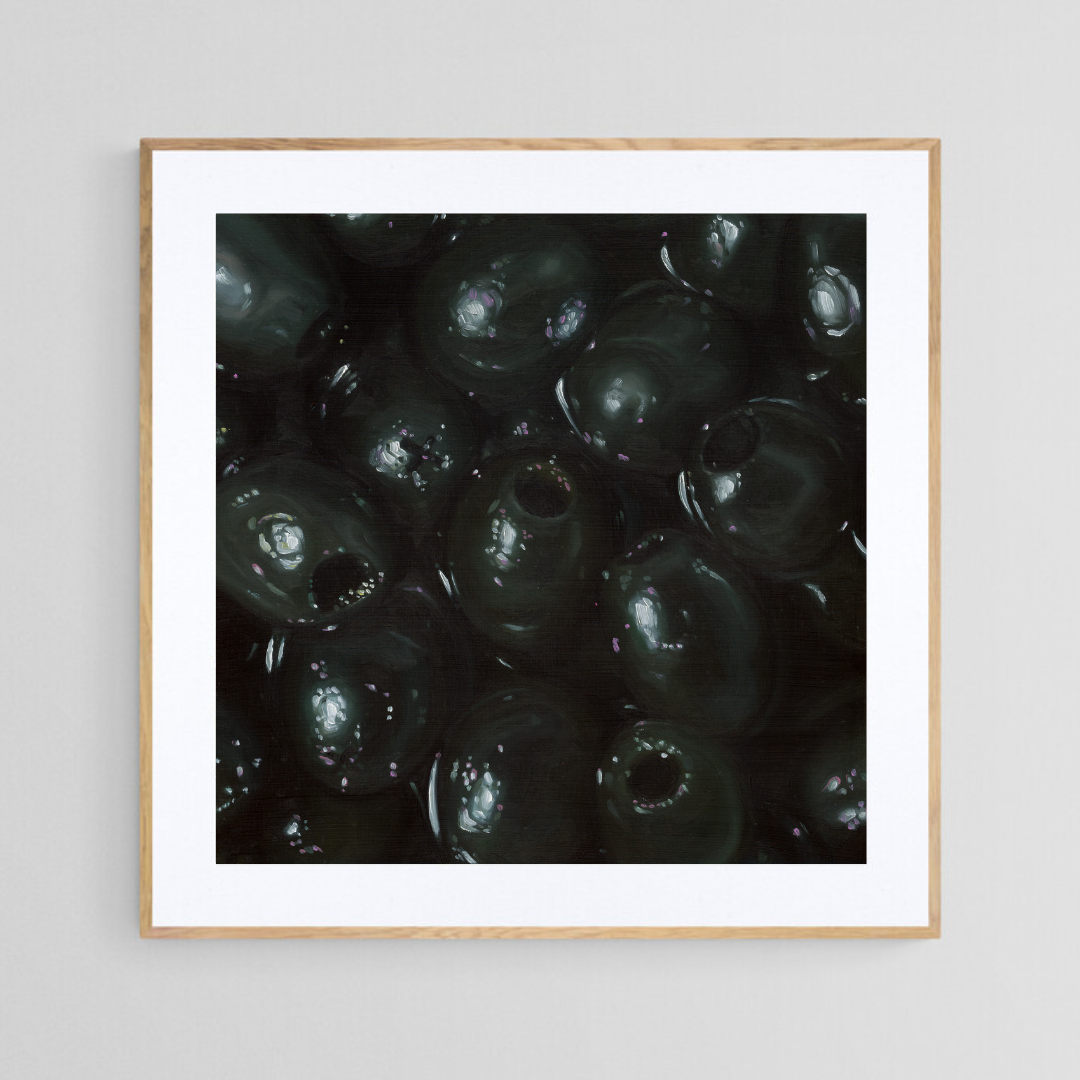 The original painting “Black Olives" by Hannah Kilby from Hannah Michelle Studios, displayed as a 12x12" fine art print in a 16x16" oak frame.