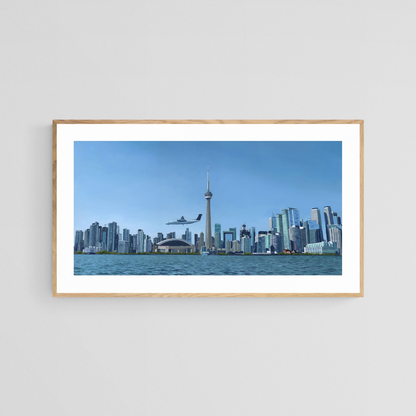 The original painting “Descent Into Toronto" by Hannah Kilby from Hannah Michelle Studios, displayed as a 12x24" fine art print in an oak frame.