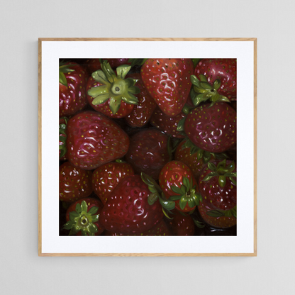 The original painting “Strawberries" by Hannah Kilby from Hannah Michelle Studios, displayed as a 12x12" fine art print in a 16x16" oak frame.