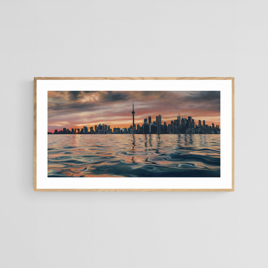 The original painting “Sundown In The 6ix" by Hannah Kilby from Hannah Michelle Studios, displayed as a 12x24" fine art print in an oak frame.