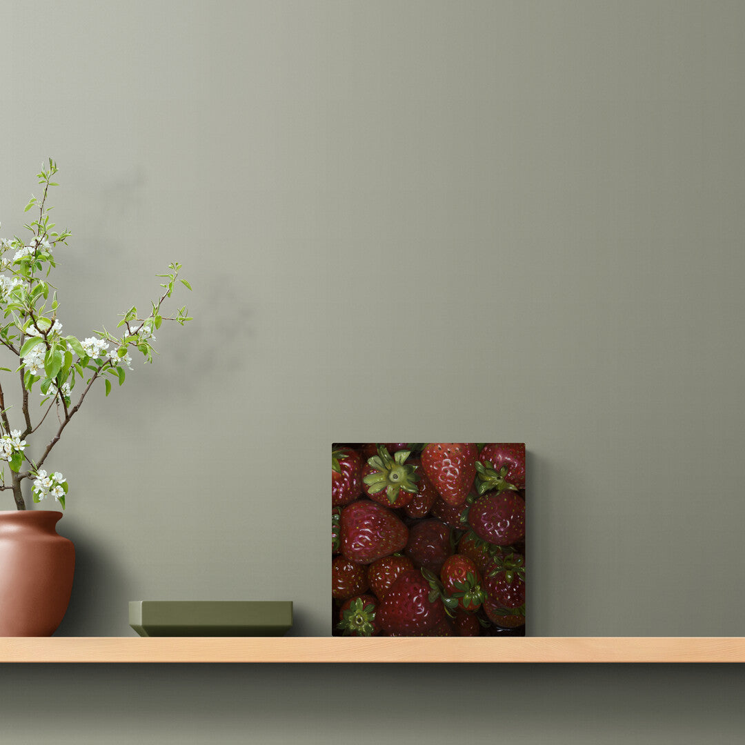 The original painting "Strawberries" by Hannah Kilby from Hannah Michelle Studios, displayed on a shelf.