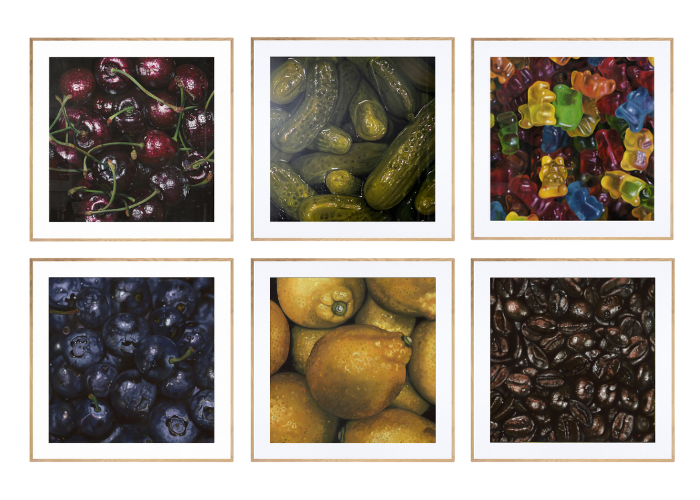 A collection of the first six paintings in the Sustenance Series by Hannah Kilby. Clockwise: Cherries, Pickles, Gummy Bears, Coffee Beans, Lemons, Blueberries.