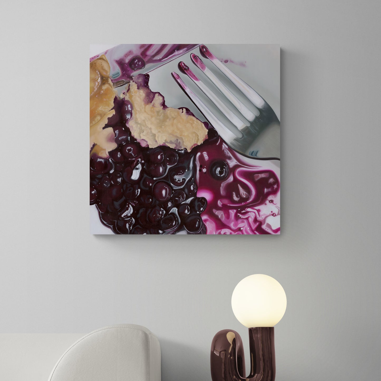 The original painting “Indulgence" by Hannah Kilby from Hannah Michelle Studios, displayed on a wall.